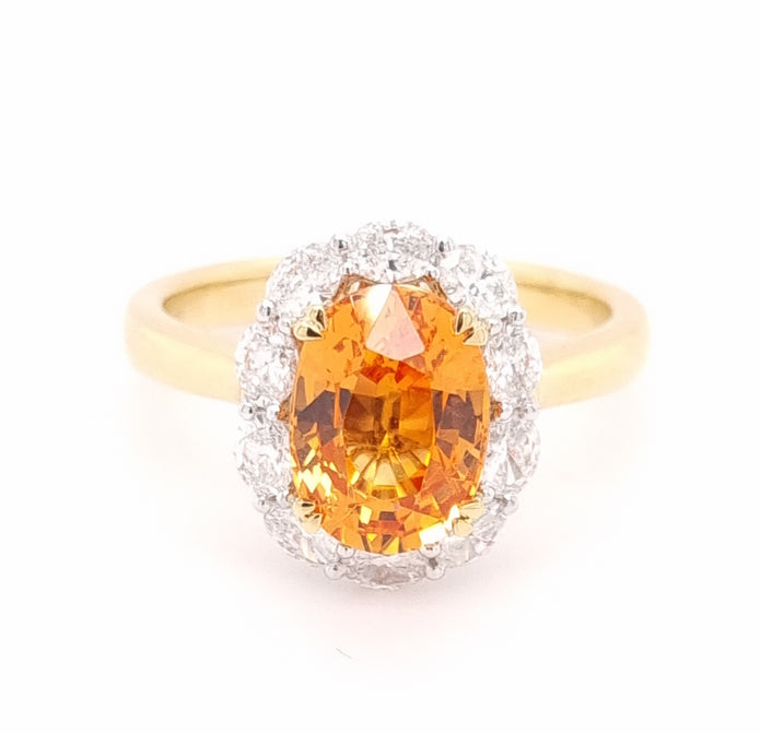 Platinum and 18ct Yellow Gold Spessartite Garnet and Diamond Ring