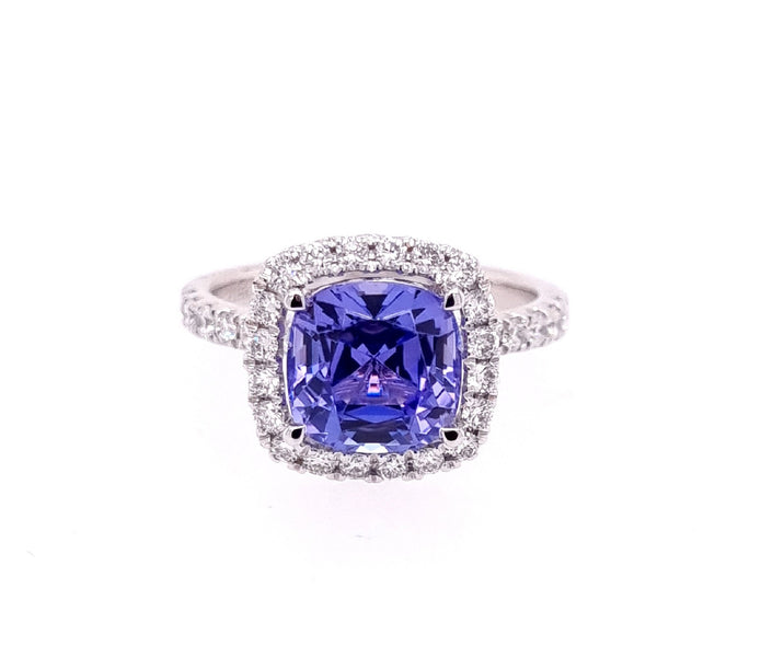 Platinum Halo Tanzanite And Diamond Ring