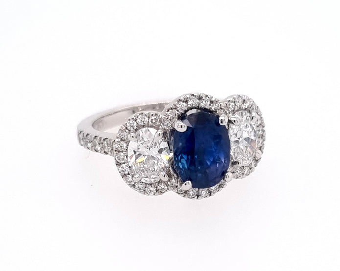 Platinum 3 Stone Sapphire and Diamond Halo Ring